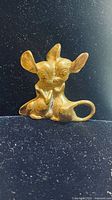 Front view of heavy solid brass figurine of two seated mice embracing