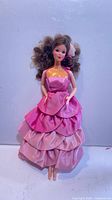 Full-length front view of 1966 Mattel Barbie doll wearing pink tiered satin gown