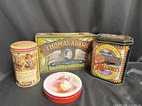 Group shot of four decorative tins