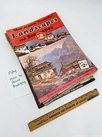 Stack of Walter Foster booklets with ruler for scale