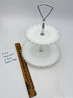 Full view of two-tier tray beside ruler