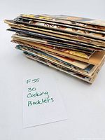 Stack of 30 vintage cooking booklets