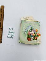 Stack of vintage Easter cards next to ruler for scale and label "Vintage Easter Cards"
