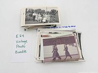 Stack of vintage photos with example top images and handwritten lot tag