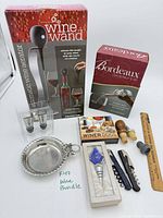All items together including boxed aerator, decanter, pourers, coaster, stopper, markers