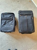 Both suitcases closed side-by-side
