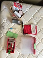 Lot overview showing basket with cards, storage box, organizer tray, fabric trim