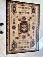 Full view of rug showing entire pattern and colors