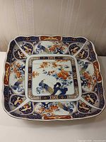 Overall view of square Imari charger showing design and form