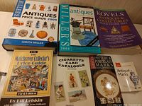 All seven books laid out showing front covers