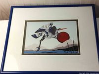 Full view of framed George Hunt Jr. silkscreen print.