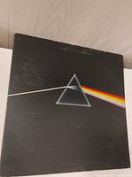 Front cover of Pink Floyd Dark Side of the Moon LP showing wear