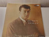 Front sleeve showing Buddy Holly portrait and album title