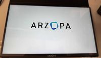 Monitor powered on displaying Arzopa logo