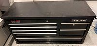 Front view of black Craftsman tool chest showing all drawers