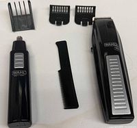Full set: hair clipper, nose trimmer, three guide combs, small comb