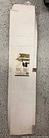 Long cardboard box with Wildcat label