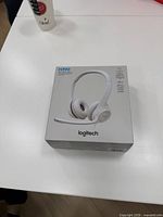 Front view of Logitech H390 headset retail box