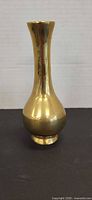 Full view of brass vase front profile