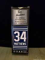 Front of sealed retail box showing Tim Hortons branding and Matthews #34