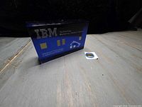 Paperweight and lapel pin overview