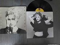 Front jacket beside inner sleeve and record