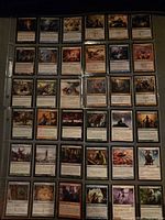 Overview of 36 Magic: The Gathering cards in clear binder pages