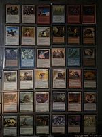 All 36 Magic cards displayed in a 4×9 binder sleeve