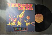 Front jacket artwork with vinyl partially removed