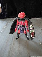 Front view of Galoob Dragon Flyz Dread Wing action figure with attached black wings