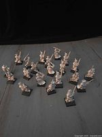 Group of 18 unpainted metal Dark Elf Warriors miniatures on bases