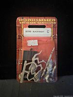 Front view of blister showing Warhammer header card, label and miniature parts