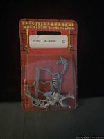 Front view of Warhammer blister pack showing 8570H Hell Knight parts and card