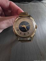 Front view of Boulevard Deluxe wristwatch showing dial design and case