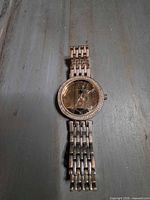 Front view of Adrienne Vittadini wristwatch showing crystal bezel and bracelet