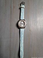 Full view of wristwatch showing strap and case