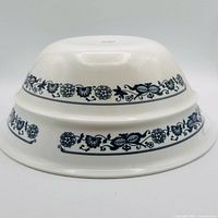 Bottom view of Corelle bowl showing Old Town Blue border and maker mark