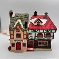 Front view of Lemax bookstore building showing storefront signage and details