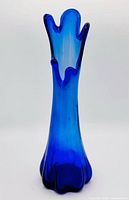 Front view of cobalt blue five-finger swung vase