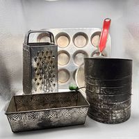 Front view showing all five bakeware items