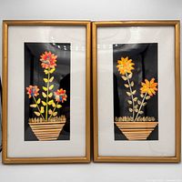 Front view showing both framed straw artworks