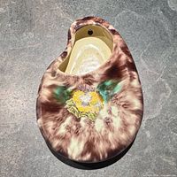 Front view showing shape, glaze and floral decal