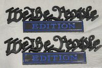 Front view showing both decals with text and enamel detail