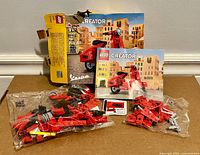 Sealed bags, damaged box back, instruction booklet visible