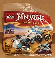 Front of sealed LEGO NINJAGO 30674 polybag showing artwork, piece count and 2-in-1 logo