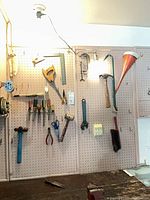 Overview of pegboard displaying all hand tools noted