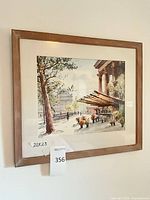 Framed print on wall showing full view and size note 20 x 23