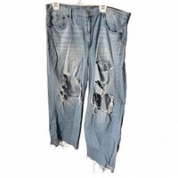 Front view showing distressing and frayed hems