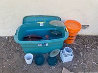 Overview of all items including tote, bucket, feeders, flower frogs and planter