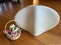 Vase and soap flower basket shown together